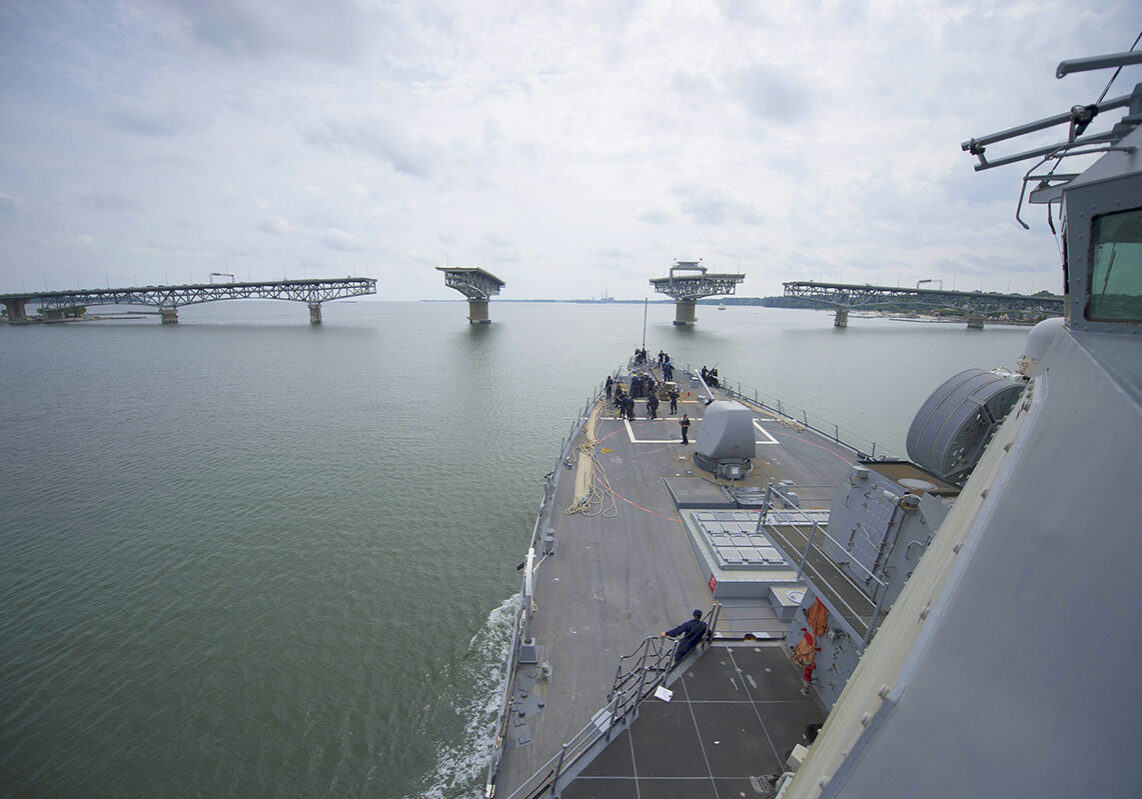 150912-N-XG464-068
YORKTOWN, Va. (Sept. 11, 2015) The guided-missile destroyer USS Carney (DDG 64) prepares to transit through the George P. Coleman Memorial Bridge. Carney is the fourth Arleigh Burke-class destroyer to be forward deployed to Rota, Spain to serve as part of the president's European phased adaptive approach to ballistic missile defense in Europe. (U.S. Navy photo by Mass Communication Specialist 3rd Class Jonathan B. Trejo/Released)